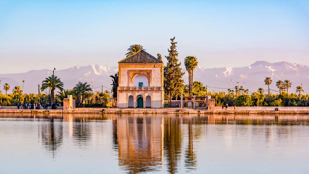 Best Places to Travel in Morocco. el menara and atlas mountain in marrakech