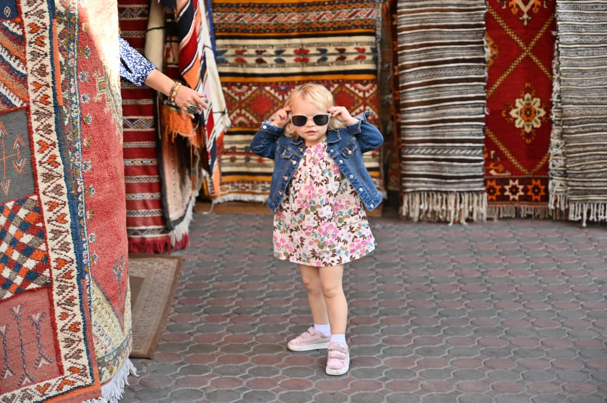 Perfect Day in Casablanca: The Classics Child shopping for carpets in the Habous of Casablanca